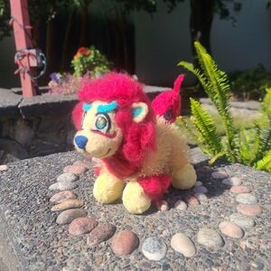 Old thrifted lion plush, turned into a komainu